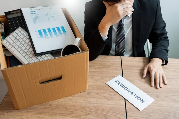 Businessperson carrying packing personal company on brown cardbo — Stock Photo, Image