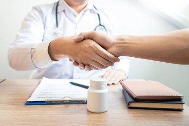 Tıp Sağlık ve güven kavramı, doktor el sallayarak