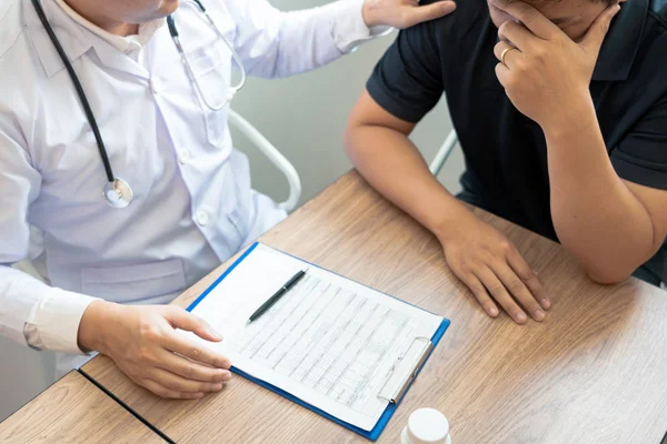 Doctor explaining and giving a consultation to a patient medical