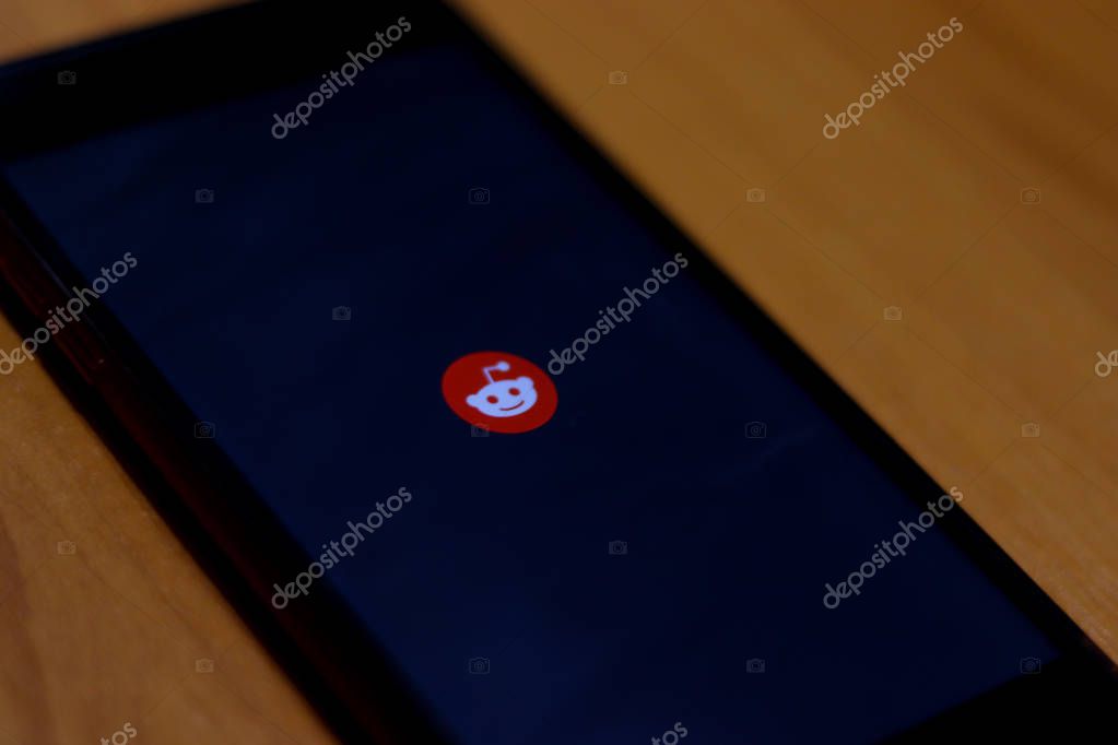 Reddit icon on phone screen close up. Los Angeles, California, USA - 13 October 2019, Illustrative Editorial