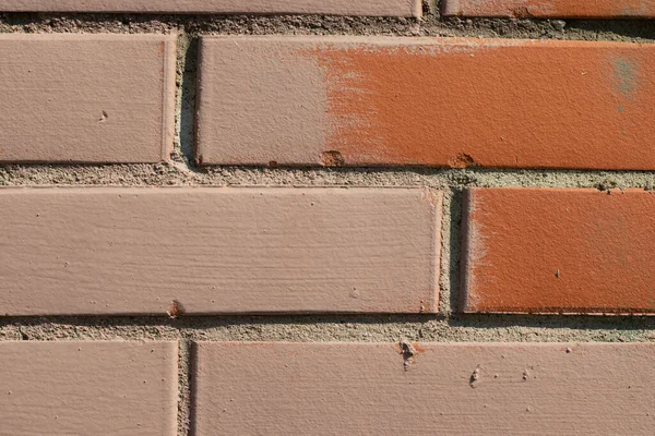 붉은 벽돌 벽의 질감이 뭉쳐 있다. 주황색 과 분홍색 배경 복사 공간 — 스톡 사진
