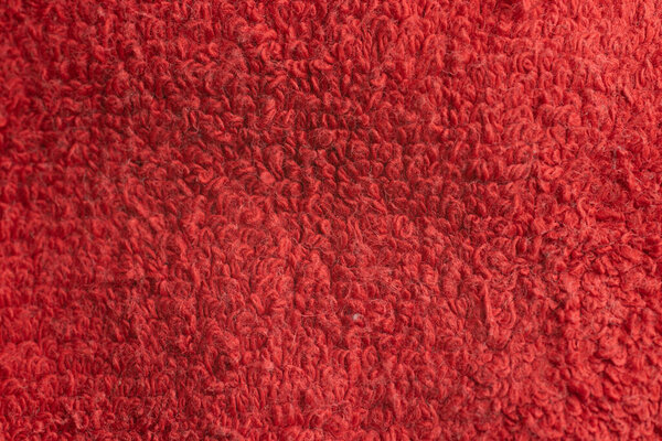 Красная ткань ткань текстуры фона. Текстурированная поверхность
