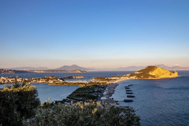 The panorama of the beach of miseno, of the mountain of miseno with the lake of Bacoli behind it. A small peninsula in the Gulf of Naples clipart