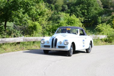 PESARO COLLE SAN BARTOLO , ITALY - MAY 17 - 2018 : BRISTOL 400 FARINA1949 on an old racing car in rally Mille Miglia 2018 the famous italian historical race (1927-1957) clipart