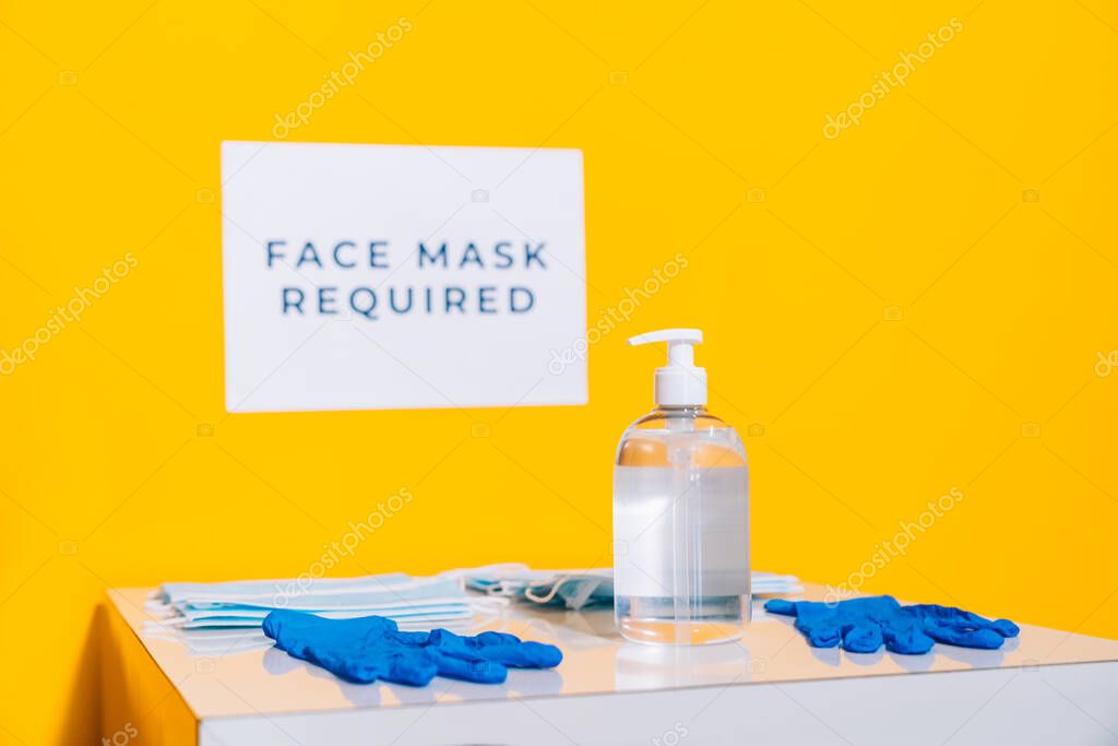 Entrance to a classroom where it is required to wear a face mask and use disinfectant gel to avoid spreading the covid-19. Reopening and adaptation of schools to the new normal.