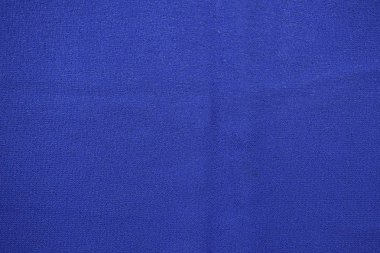 Kumaşın dokusu. Kıyafetler için kumaş falan. Fabrikalarda, evde kullanılır. Moda gösterileri için. Günlük hayatta. Konut için. Fotoğraf.