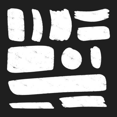 Elle çizilmiş karalama kalem fırçaları. Elle çizilmiş grunge konturları ve grafik öğeleri kümesi. 