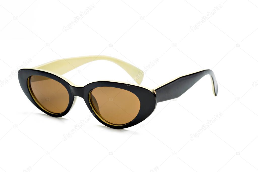 Glamorous women's sunglasses isolated on white background.