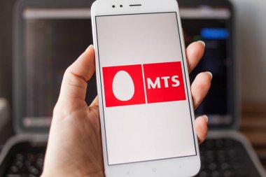 SAINT PETERSBURG, RUSSIA - MAY 14, 2019: Logo of the Russian company MTS on the smartphone screen. clipart