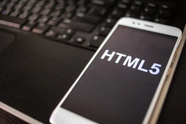 HTML5 Programming language for mobile development, concept. Smartphone