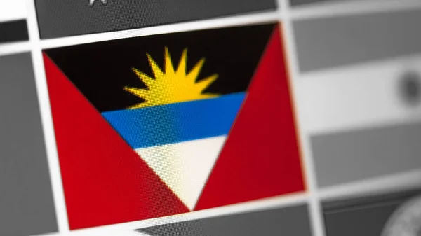 Antigua and Barbuda national flag of country. flag on the display, a digital moire effect.