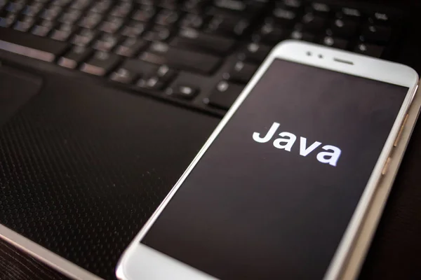 Java Programming language for mobile development, concept. Smartphone