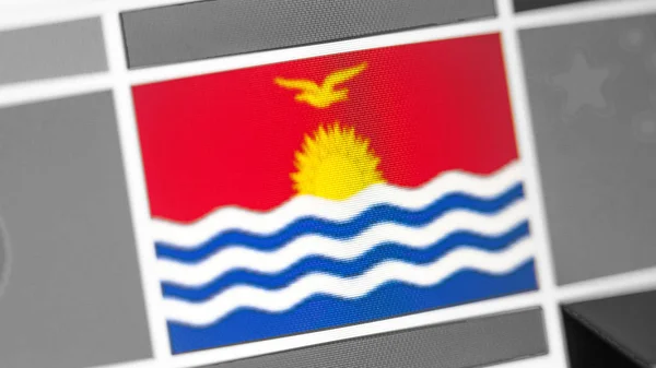 Kiribati national flag of country. Kiribati flag on the display, a digital moire effect.