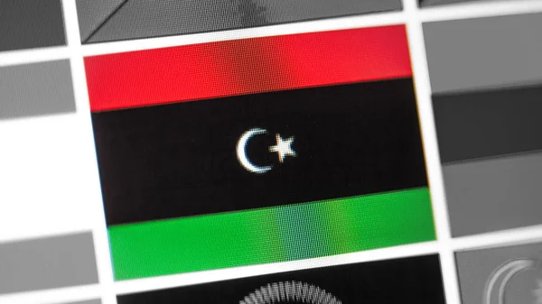 Libya national flag of country. Libya flag on the display, a digital moire effect.