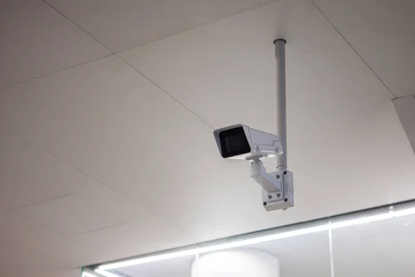 CCTV camera in the subway room, public place, security and video surveillance. — Stock Photo, Image