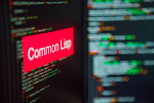Programmeringsspråk, common lisp inskription på bakgrunden av datorkod. — Stockfoto