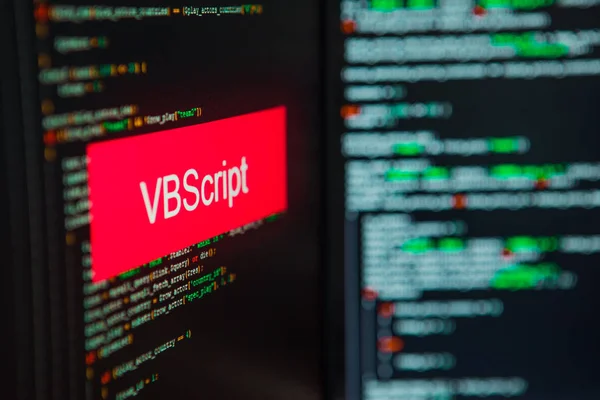 Lenguaje de programación, inscripción VBScript en el fondo del código informático . — Foto de Stock