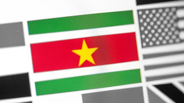 Suriname national flag of country.Suriname flag on the display, a digital moire effect.