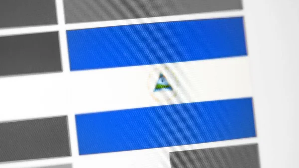 Нікарагуа Національний прапор країни. Прапор Нікарагуа на дисплеї, цифровий ефект Муар. — стокове фото