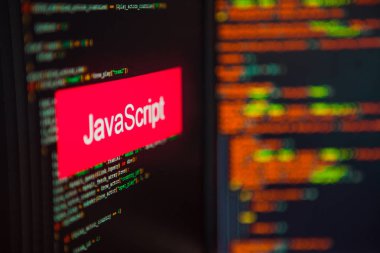 Programlama dili, bilgisayar kodunun arka planında JavaScript yazıt.