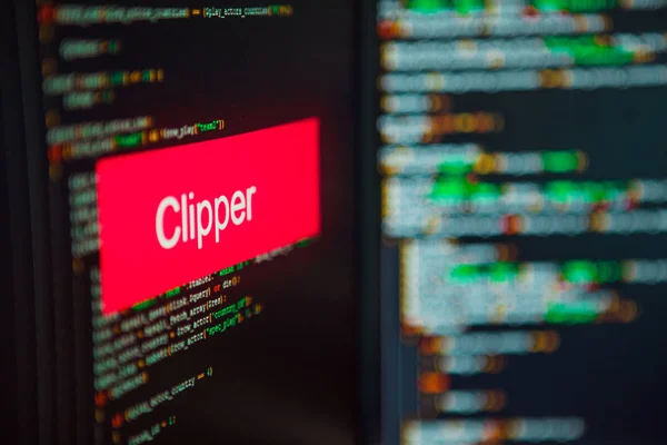 Programmering språk, Clipper inskription på bakgrunden av datorkod. — Stockfoto