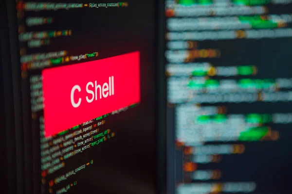 Lenguaje de programación, inscripción C shell en el fondo del código informático . — Foto de Stock
