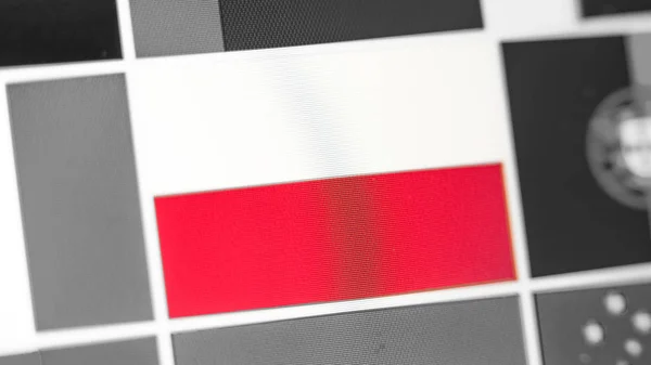 Poland national flag of country. Poland flag on the display, a digital moire effect.