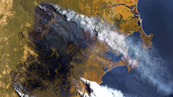 Forest fires in Australia, a view from space. Environmental problems, a large fire in the forest,