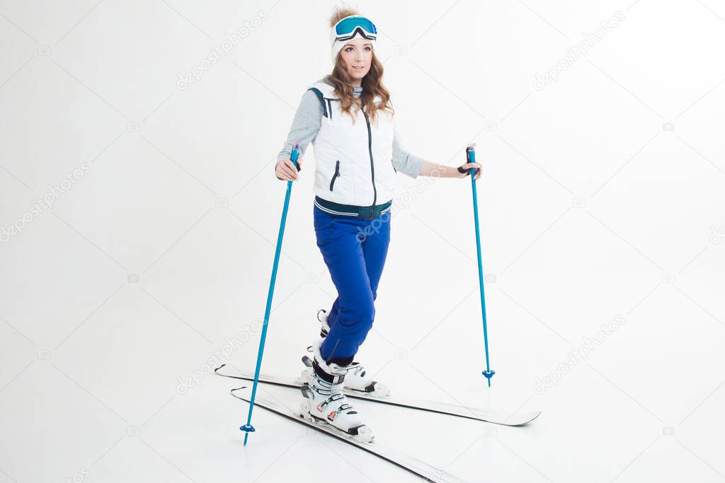 Skier maneuvers on mountain skis, photos on a white background in the Studio,