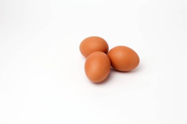 brown eggs not painted on a white background isolated