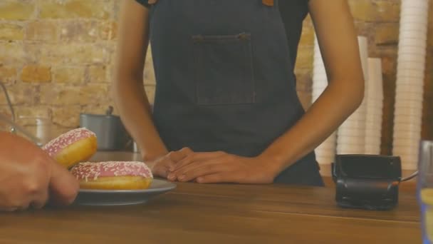 Smiling Waitress Giving Cup Coffee Donats Customer — Stock Video