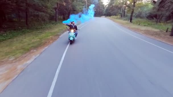 Couple Riding Scooter Girl Hands Holding Flare — Stock Video