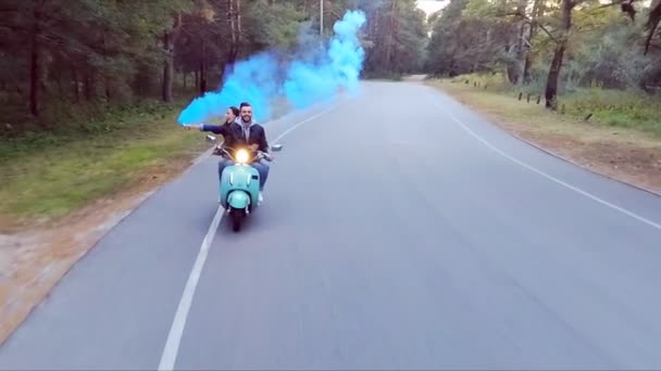 Couple Riding Scooter Girl Hands Holding Flare Slow Motion — Stock Video