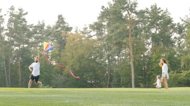 Family Having Fun Outdoors Weekend Father Running Kite Slow Motion — Stock Video