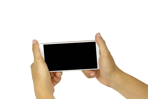 空白の黒い画面が付いている白い携帯電話を握るクローズアップ手 — ストック写真
