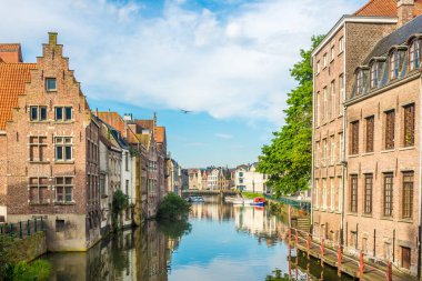 The banks of Leie River with typical buildings in Ghent, Belgium clipart