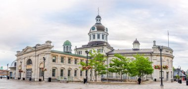 Panoramic view at the building of City hall with market in Kingston, Canada clipart