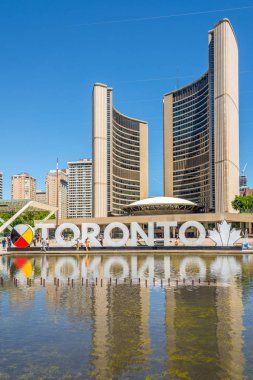 TORONTO,CANADA - JUNE 25,2018 - View at the buildings of New City hall in Toronto. Toronto is the capital city of the province of Ontario and the largest city in Canada. clipart