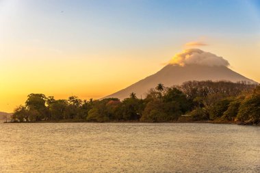 In the evening at the Nicaragua lake with Conception Volcano in Ometepe Island - Nicaragua clipart