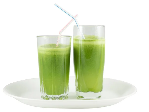 ストローを使ったグラスの中の緑野菜ジュース — ストック写真