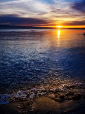 Sunset at the breakwater in  Victoria BC, Canada clipart