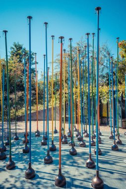 Colorful iron pipes fountain at daytime 