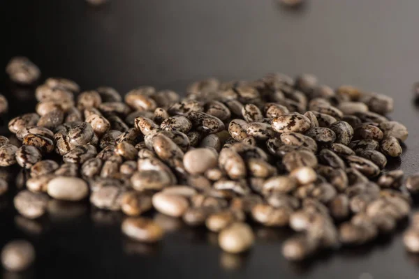 Closeup of beans pattern on dark studio background