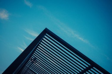 Wooden planks planks pattern, blue sky background 