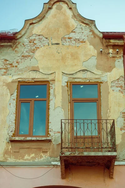 Closeup of old house on European street at daytime