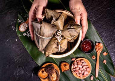 Zongzi, delicious fresh hot steamed rice dumplings in steamer. Close up, copy space, famous asian tasty food in dragon boat duanwu festival