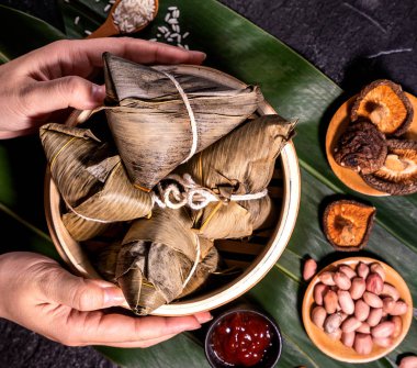 Zongzi, delicious fresh hot steamed rice dumplings in steamer. Close up, copy space, famous asian tasty food in dragon boat duanwu festival