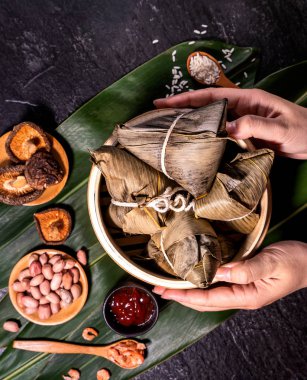 Zongzi, delicious fresh hot steamed rice dumplings in steamer. Close up, copy space, famous asian tasty food in dragon boat duanwu festival