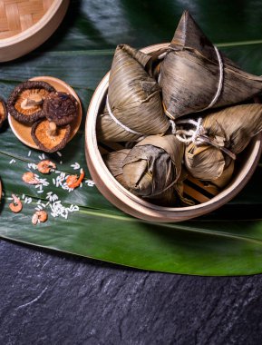 Zongzi, delicious fresh hot steamed rice dumplings in steamer. Close up, copy space, famous asian tasty food in dragon boat duanwu festival