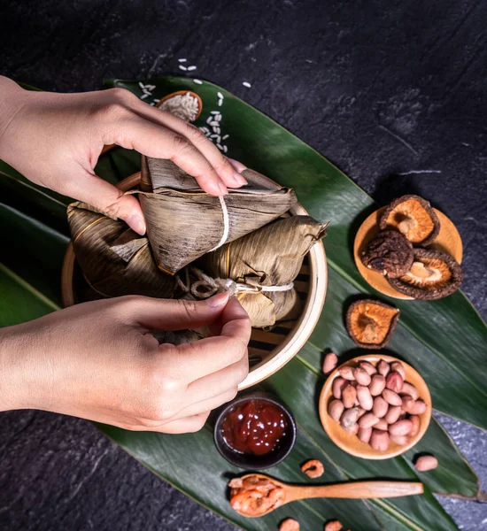 Zongzi, delicious fresh hot steamed rice dumplings in steamer. Close up, copy space, famous asian tasty food in dragon boat duanwu festival